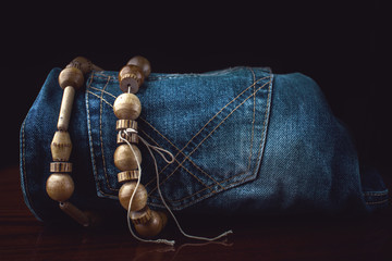Jeans and wooden jewelry