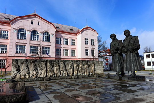 School and statue
