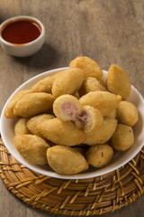 Brazilian snack fried with cheese ham