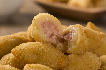 Brazilian snack fried with cheese ham