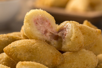 Brazilian snack fried with cheese ham