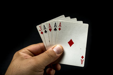 Obraz premium Hand holding poker cards