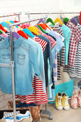 Clothes for kids on hangers