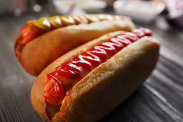 Hot dogs on wooden background