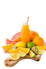 Juice with selection of tropical fruits, isolated on white