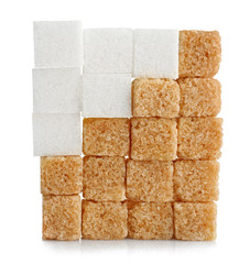 Pile of brown and white sugar cubes isolated on white background