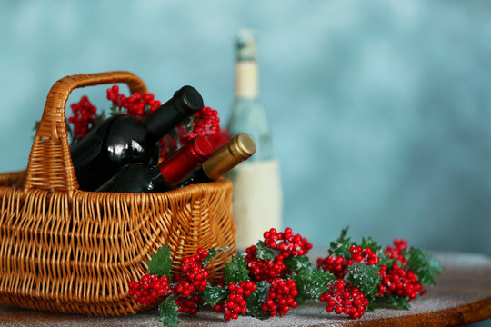 Christmas wine in basket on table