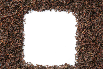 Frame of dry tea on white background