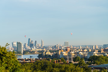 Fototapeta na wymiar Greenwich skyline two balloons