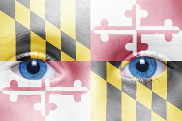 human's face with maryland state flag