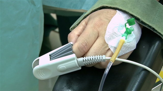 Close up of patient's hand during surgery