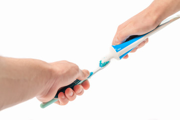 Toothbrush with toothpaste in the hand