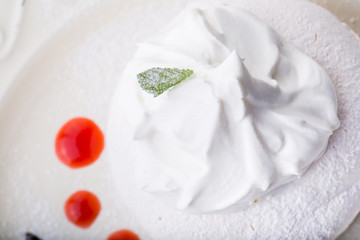 white bizet cookie on white plate. top view