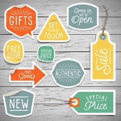Stickers on rustic wood background for retail