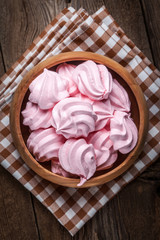 Pink meringue cookies.