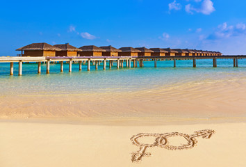 Sex symbols on beach