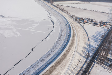 Fototapeta na wymiar aerial view over the harvest fields in winter