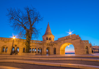 Fototapeta na wymiar Fisherman's Bastion in Budapest, Hungary Illuminated at Night and Clear Blue Sky