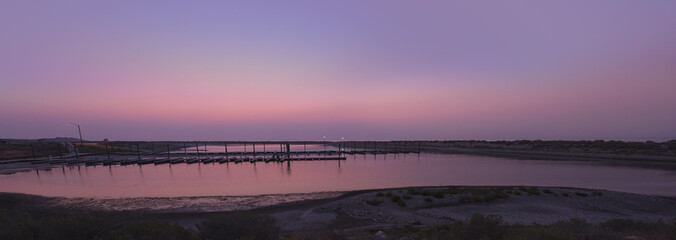 Panorama of pier in twilight at Antelope Island on Great Salt Lake, Utah