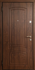 Fototapeta premium The iron door with a wooden pattern.