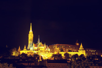 Fototapeta na wymiar Night View with Matthias Church in Budapest, Hungary. Vintage look