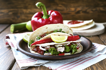 Tacos on a wood background