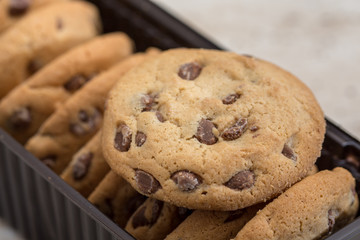 Brown biscuits cookies with chocolate parts