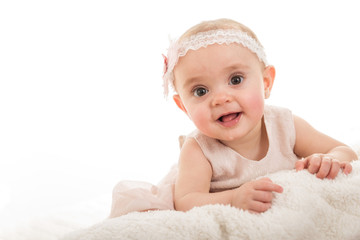 Child girl leaning on blanket against white background