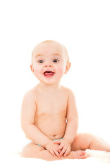 Baby with diaper smiling on white background