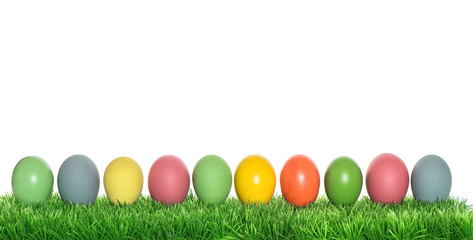 Easter eggs in green grass holidays banner