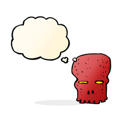 cartoon spooky skull with thought bubble