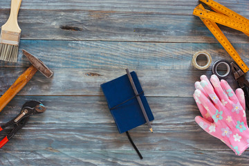 Book and notes on carpenter's table