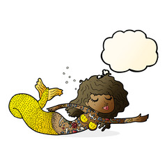 cartoon mermaid covered in tattoos with thought bubble