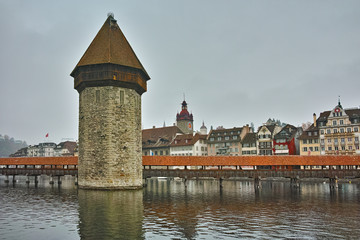 Fototapeta premium Amazing panorama of Chapel Bridge over Reuss River in Lucerne, Switzerland