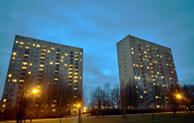 Fototapeta na wymiar Skyscrapers on a housing estate at night in Poznan.