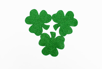 Three party favor glitter shamrocks for St. Patrick's Day.