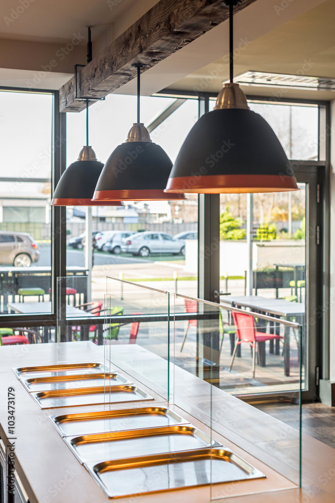 Wall mural Lunch counter at modern public catering restaurant