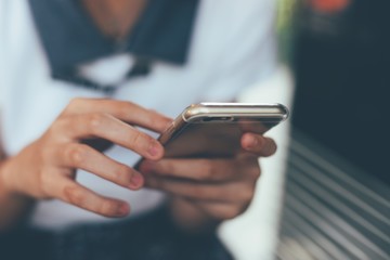 girl with smartphone vintage color