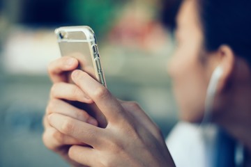girl with smartphone vintage color