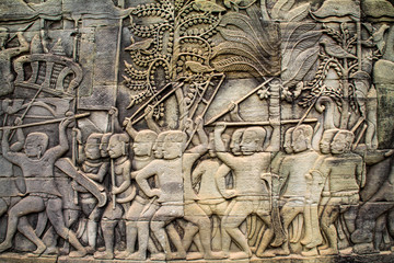 Fototapeta na wymiar Stone carvings on Angkor Wat, Siem Reap, Cambodia