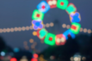 beautiful background of bokeh lights at night on road with car