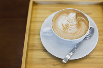 Hot art Latte Coffee in the table