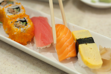 Sushi with chopsticks