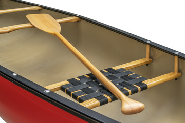 wooden paddle and canoe