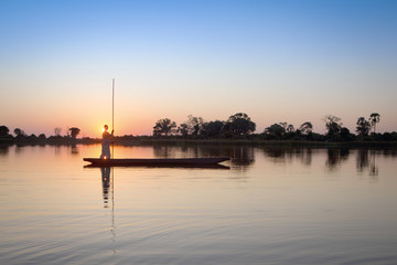 Fototapeta premium Mokoro poler in the Okavango Delta.