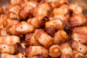  fried pork Sausages wrapped in bacon