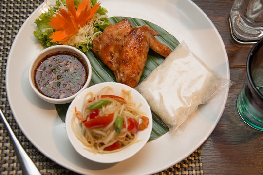 Green papaya salad, grilled chicken and sticky rice