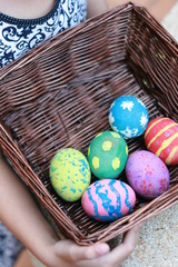 Colorful Easter eggs in a basket