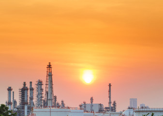 Fototapeta na wymiar Oil refinery at sunset, petrochemical plant - factory