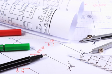 Rolls of electrical diagrams and accessories for drawing